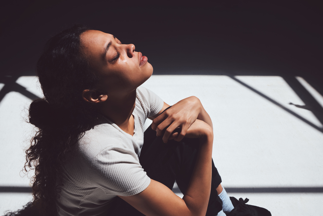woman with ptsd crying