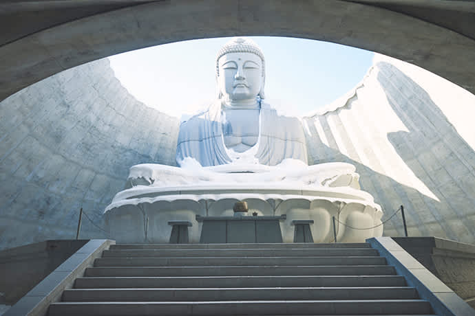 Visitors pass through a tunnel to reach the Great Buddha.