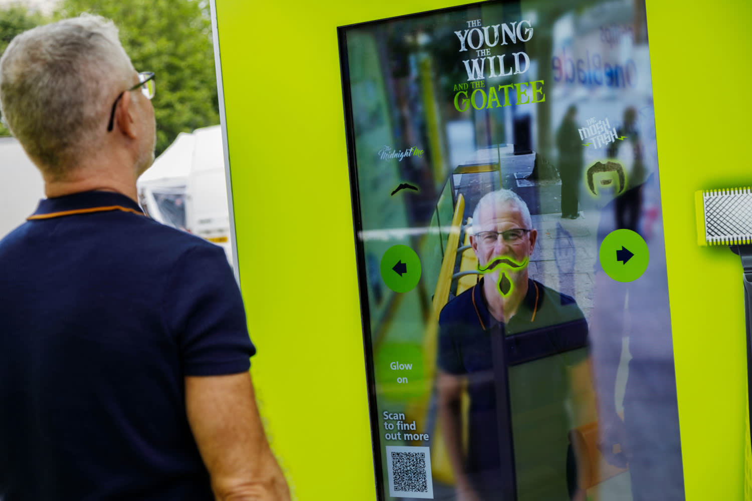 Digital screen showing ad for The Young The Wild AND The Goatee