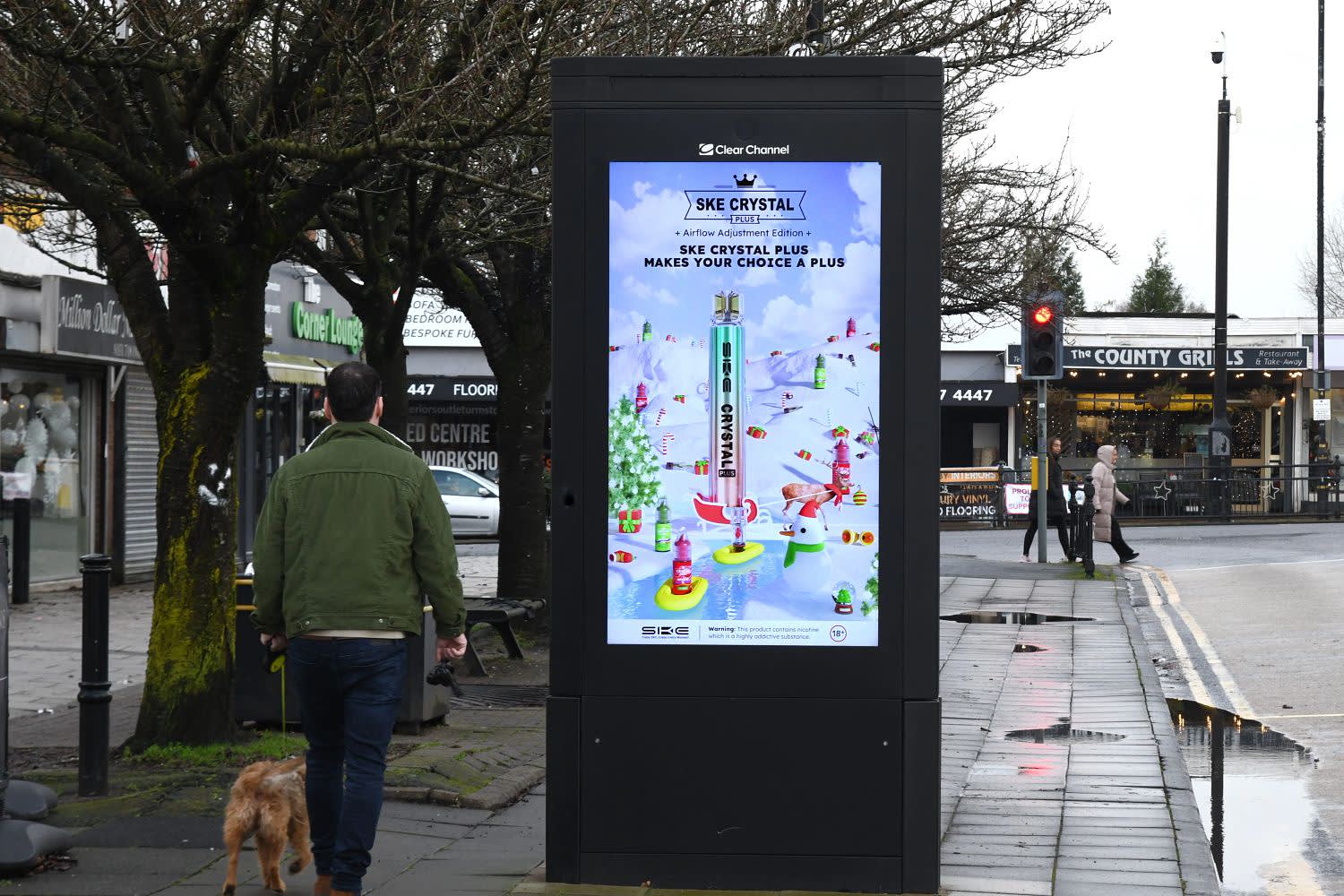 A SKE CRYSTAL vape campaign displaying on a digital Adshel Live screen